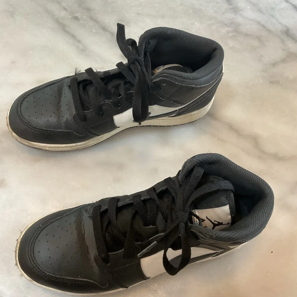 Jordan Kids Black and White High-Top Sneakers